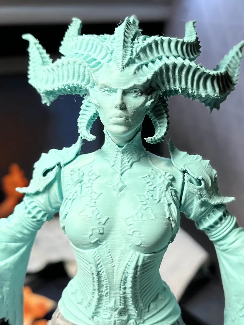 Unpainted 3D print of Lilith, a horned figure, in mint filament